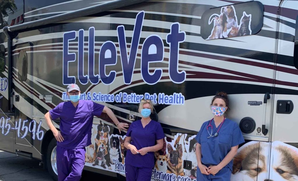 ElleVet Staff in Front of Bus